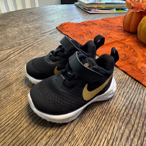 Black & Gold Baby Nikes - Picture 1 of 8